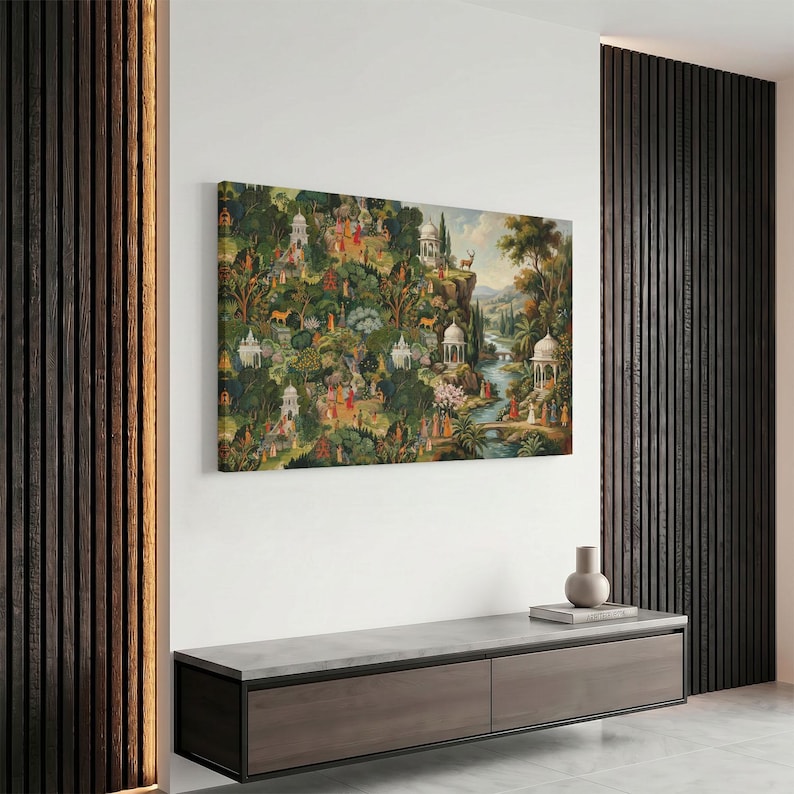 May include: A rectangular wall art print featuring a dense, lush landscape filled with numerous small figures in colorful traditional attire, white domed architectural structures, various trees, and a winding river flowing through a hilly terrain.