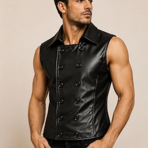 May include: A black sleeveless vest made of a smooth material with a wide collar and a double-breasted front featuring ten round black buttons arranged in two vertical columns. The garment has a tailored fit and a straight hemline at the waist.