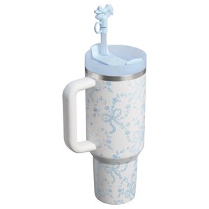 Floral bow tumbler with handle, Stanley style insulated travel mug with feminine floral and ribbon design.