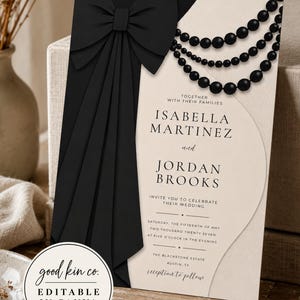 May include: A wedding invitation card featuring a black bow and black pearl strands on a cream background. The text reads: Together with their families Isabella Martinez and Jordan Brooks invite you to celebrate their wedding Saturday, the fifteenth of May two thousand twenty seven at five o'clock in the evening, The Blackstone Estate Austin, TX, reception to follow.