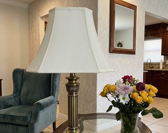 Large cream colored empire style lamp shades.