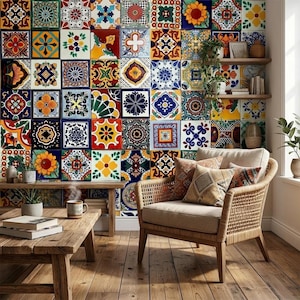 May include: A wall covered in square ceramic tiles featuring diverse colorful geometric and floral patterns in blue, yellow, red, and green. A light brown woven armchair with beige cushions sits in front of the wall, next to a wooden coffee table.