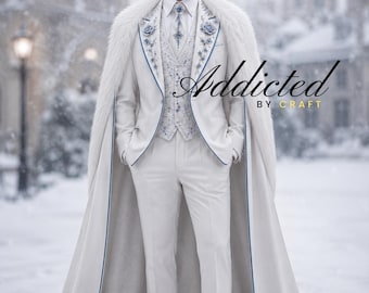 May include: A white suit featuring a vest with blue floral embroidery, a white dress shirt, a matching tie with a blue gemstone, and a long white cape with a fur collar. The text Addicted BY CRAFT is visible on the right side of the image.