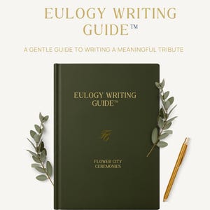 May include: A dark green hardback book titled EULOGY WRITING GUIDE with gold lettering, featuring the text FLOWER CITY CEREMONIES and an FC monogram. The book is flanked by two green leafy sprigs and a gold pen on a light cream background.