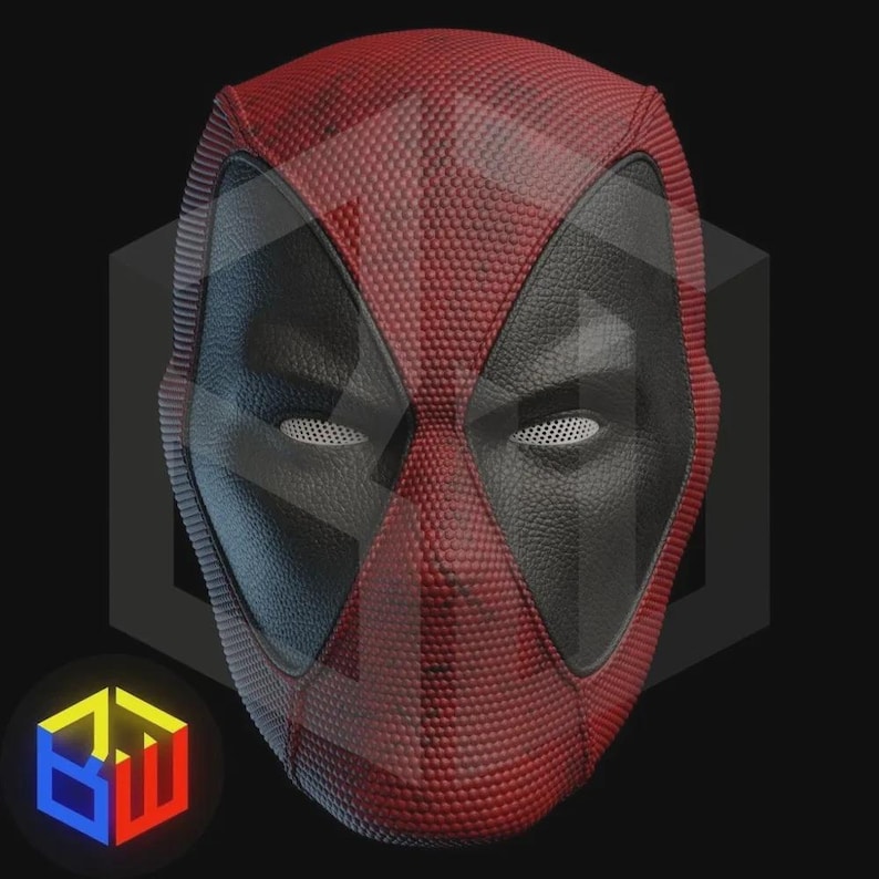 May include: A full-face mask featuring a textured red and black design. The mask has large, almond-shaped eye openings covered with a white mesh material. The surface displays a distinct honeycomb-like pattern on the red sections and a smooth leather-like texture on the black sections surrounding the eyes.