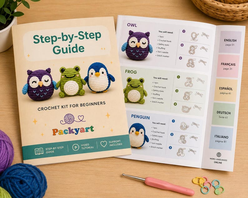 May include: A crochet kit for beginners with a step-by-step guide. The cover features a purple owl, green frog, and blue penguin. The open book shows instructions and a pink crochet hook with stitch markers.