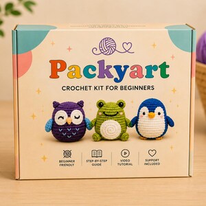 May include: A Packyart crochet kit for beginners, with an owl, frog, and penguin design. The box includes beginner-friendly instructions, a step-by-step guide, video tutorials, and support. The kit's design is colorful, with a teal and peach background.