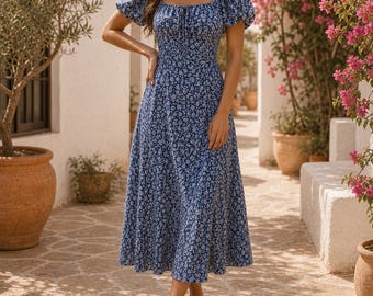 Vestido midi estilo lechera con estampado floral, escote cuadrado y mangas abullonadas, ideal para el verano y el estilo cottagecore.