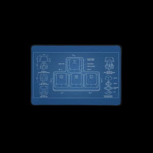May include: A rectangular desk mat featuring a blue technical blueprint design of mechanical keyboard switches and keycaps labeled with the letters Q, S, D, and Z. The graphic includes detailed cross-section diagrams and technical annotations.