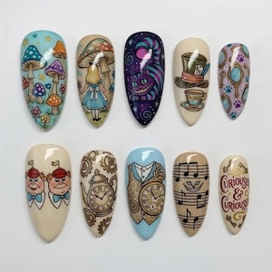 May include: A set of ten almond-shaped press-on nails featuring hand-painted illustrations inspired by Alice in Wonderland, including mushrooms, a character in a blue dress, a purple striped cat, a top hat, mirrors, clocks, and the text Curious & Curious.