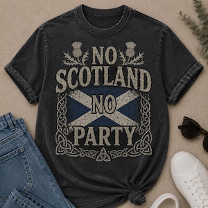 May include: A charcoal gray short-sleeve t-shirt featuring a distressed graphic print. The design includes the text NO SCOTLAND NO PARTY, a blue and white saltire flag, two thistle illustrations, and a decorative Celtic knot border frame.