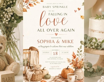 May include: A baby sprinkle invitation card featuring autumn leaves, a wicker basket with a teddy bear, a pumpkin, and a mug. The text reads: Please join us for a baby sprinkle, we're falling in love all over again, honoring Sophia & Mike.