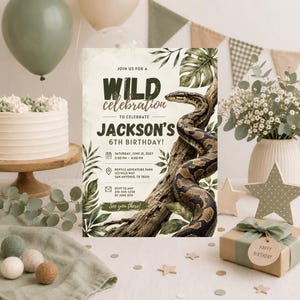 May include: A rectangular birthday invitation card featuring a snake coiled around a tree branch, surrounded by tropical leaves. The text reads: JOIN US FOR A WILD celebration TO CELEBRATE JACKSON'S 6TH BIRTHDAY! SATURDAY, JUNE 15, 2027, 2:00 PM - 4:00 PM, REPTILE ADVENTURE PARK, 123 WILD WAY, SAN ANTONIO, TX 78201, RSVP TO AMY 210-555-1234 BY JUNE 8TH. See you there!