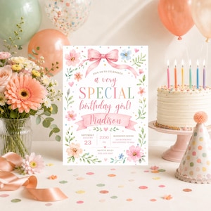 May include: A rectangular birthday invitation card featuring a pink ribbon bow at the top, floral illustrations, and the text: Join us to celebrate a very special birthday girl! Madison, Saturday August 23, 2:00 PM, Madison's House, 1234 Bloom Way, San Antonio, TX 78209, RSVP to Kelly 555.123.4567.