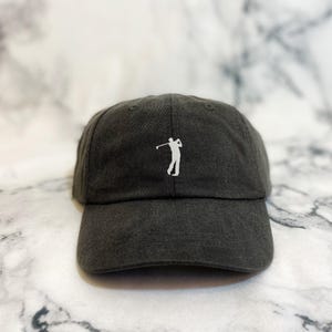 Embroidered Golfer Hat: Garment-Dyed Cotton Cap with Leather Strap