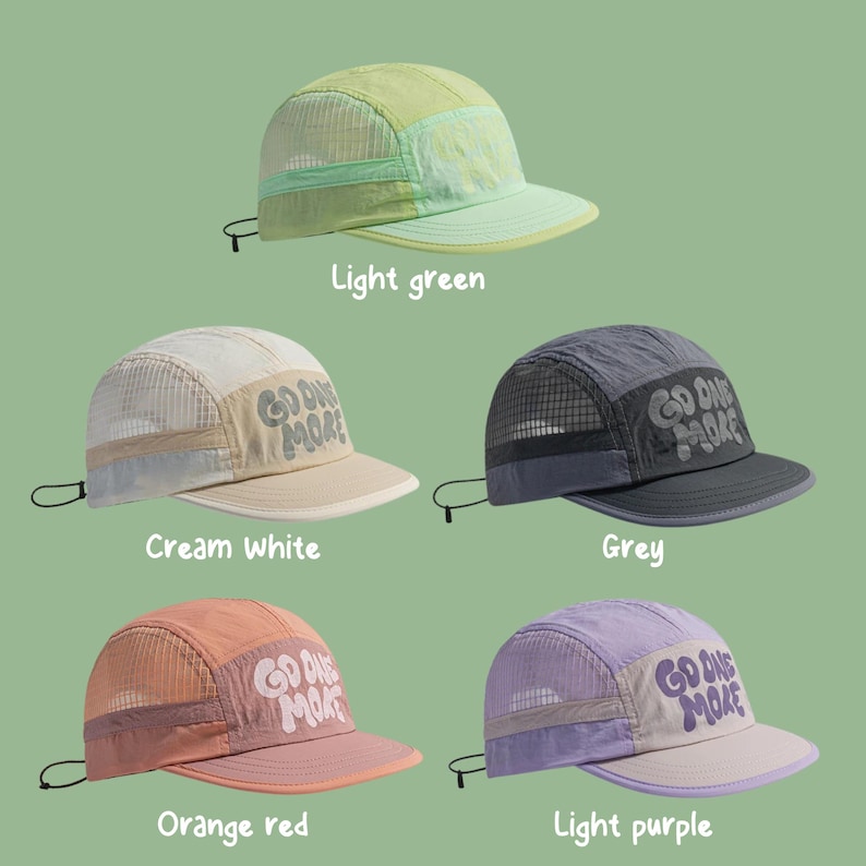 May include: Five five-panel caps with mesh side panels and adjustable back cords. Each cap features the text "GO ONE MORE" on the front panel. The colors include light green, cream white, grey, orange red, and light purple, all with matching brims.