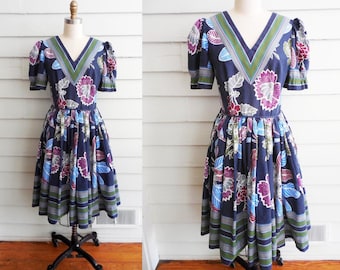 1950s blue, purple and green flowered dress / Small to Medium vintage floral dress with V neck and puff sleeves / square