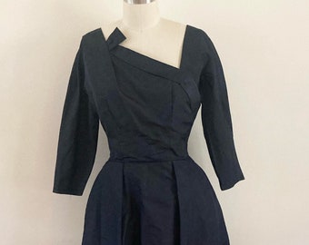 1950s Black Taffeta Party Dress: Fit and Flare, Asymmetrical Bodice, Crinoline Skirt