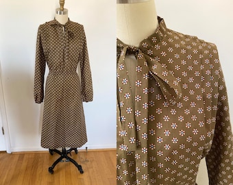 vintage 1970s secretary dress / brown pinwheel dress / midi long sleeve dress balloon sleeves neck tie / large to extra large dress