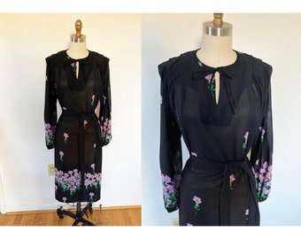 vintage large 1970s floral dress / black dress purple orange green flowers / midi long sleeve dress balloon sleeves neck tie / extra large