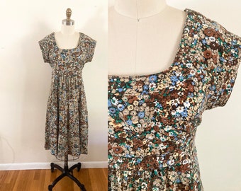 vintage 1970s ditzy floral dress / small to medium patterned fit and flare empire waist dress / short sleeve cotton dress / Jonathan Logan