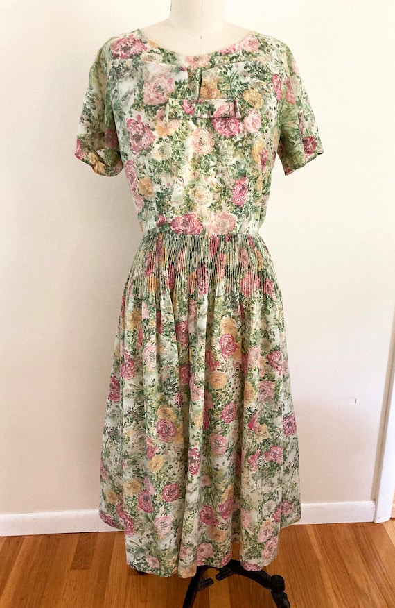 medium large vintage 1960s floral midi dress / green and pink floral / bow detail / accordion pleating / short sleeves / romantic flowers