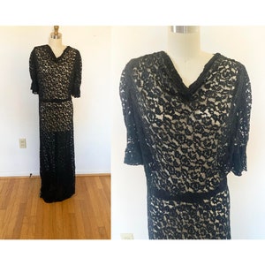 gorgeous vintage black lace gown / Medium to Large long black dress / see-through with gathered neck and short sleeves / floor length dress