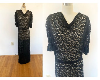 gorgeous vintage black lace gown / Medium to Large long black dress / see-through with gathered neck and short sleeves / floor length dress