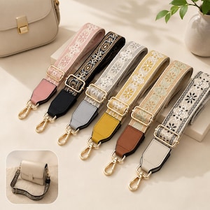 May include: Six adjustable bag straps featuring embroidered floral patterns in various colors including pink, black, grey, yellow, tan, and white. Each strap includes gold-tone metal hardware, swivel lobster clasps, and solid-colored faux leather ends.