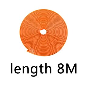 Puede incluir: Una bobina de color naranja brillante de material flexible para bordes o adornos, dispuesta en un patr&oacute;n de espiral circular. El producto tiene la etiqueta length 8M, que indica una longitud total de 8 metros para esta tira continua.