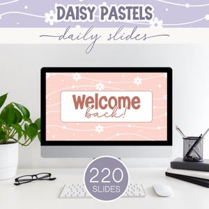 May include: A computer monitor displaying a digital slide with a light pink background, white daisy flowers, and wavy lines. The text on the screen reads Welcome back! The top banner includes the text DAISY PASTELS daily slides and a 220 SLIDES badge.