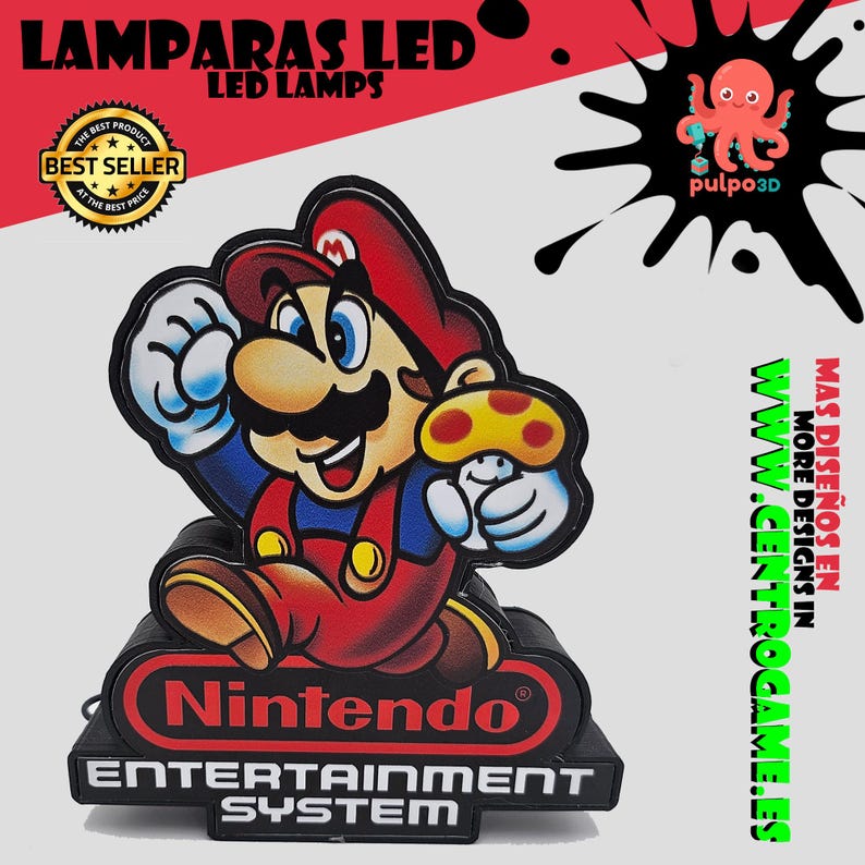 May include: A decorative LED lamp featuring a colourful graphic of Mario holding a mushroom, mounted on a black base with the Nintendo Entertainment System logo. The design includes text reading LAMPARAS LED, BEST SELLER, and pulpo3D.
