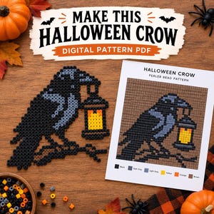 May include: A Halloween crow perler bead pattern featuring a black crow holding a lantern with yellow and orange light. The design includes a printed grid guide with color keys for black, dark gray, light gray, yellow, orange, and brown beads.