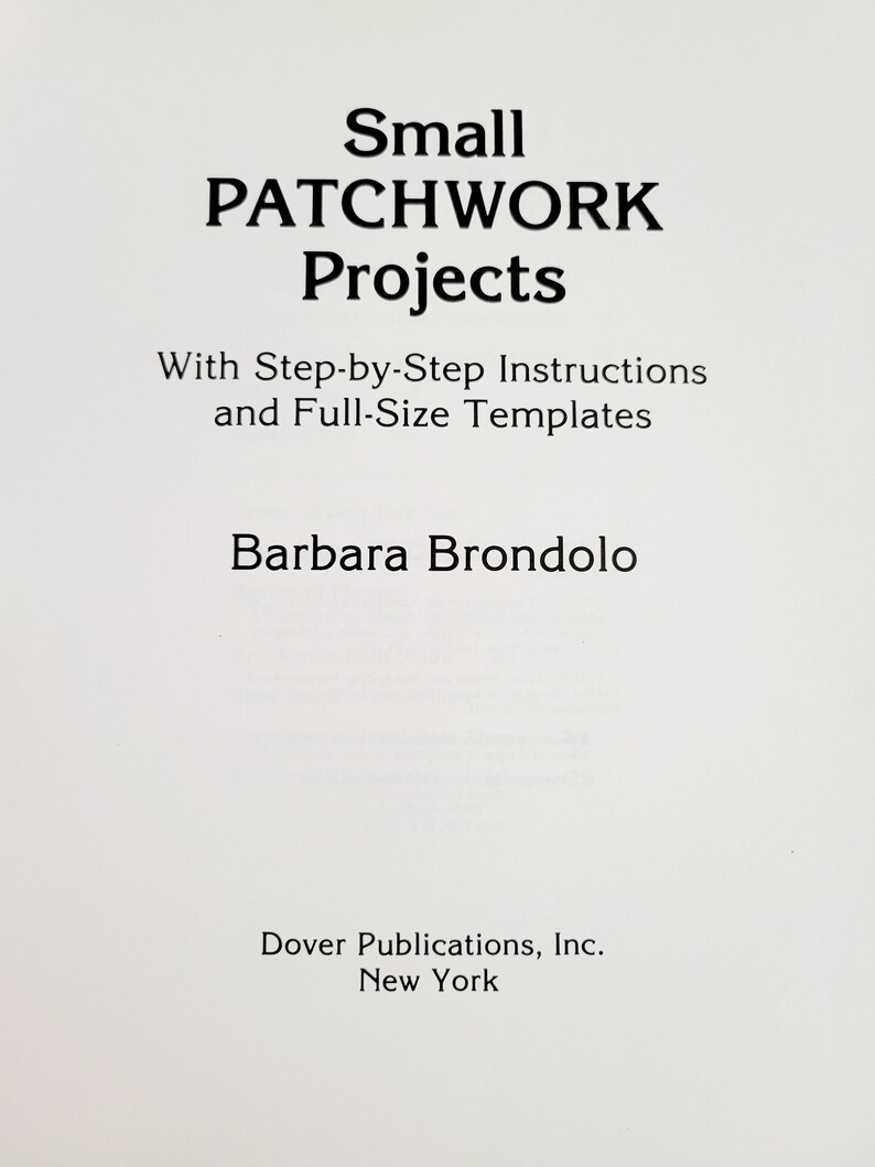 May include: A book cover with the title "Small PATCHWORK Projects" in large, bold, black letters. Below the title are the words "With Step-by-Step Instructions and Full-Size Templates." The author's name, Barbara Brondolo, is also displayed.