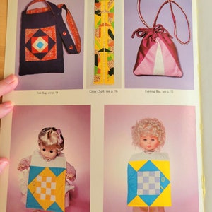 May include: A page from a vintage sewing pattern book featuring a navy tote bag with a geometric design, a colorful grow chart, and a pink evening bag. Also shown are two baby bibs with fish designs.