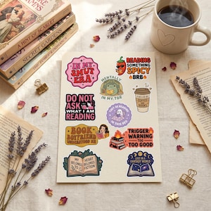 May include: A sticker sheet featuring various book-themed designs including text like In My Smut Era, Reading Something Spicy, Do Not Ask What I Am Reading, Book Boyfriend, Trigger Warning Too Good, My Heart Belongs To Fiction, and Lost In A Fantasy World.