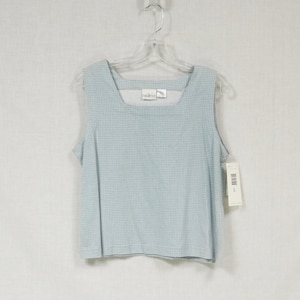 May include: A light blue sleeveless top with a white and light blue checkered pattern. The top has a square neckline and is hanging on a white hanger. The tag says "Size L".