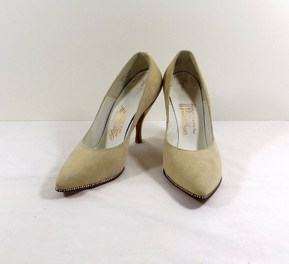 bone suede pumps