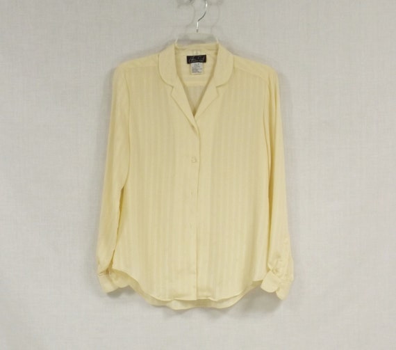 pale yellow blouse
