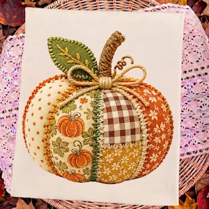May include: A fabric pumpkin decoration featuring patchwork panels of cream, orange, and brown textiles with polka dot, gingham, and floral patterns. It includes a green felt leaf, a twisted rope stem, and a decorative twine bow tied at the top.