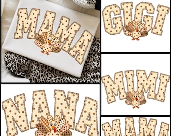 May include: A white fabric surface featuring the word MAMA in large, beige, brown-polka-dotted letters with a turkey graphic. Additional designs include the words GIGI, MIMI, and NANA, each styled with the same polka-dot font and turkey illustration.