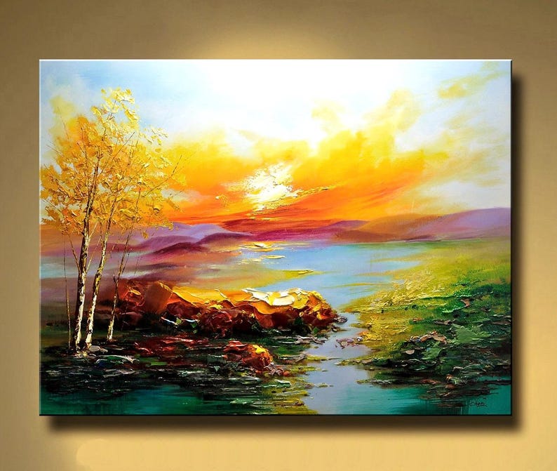 K&ouml;nnte beinhalten: Ein Gem&auml;lde, das einen Sonnenuntergang &uuml;ber einem See mit einer kleinen Insel im Vordergrund zeigt. Der Himmel ist in leuchtenden Orange- und Gelbt&ouml;nen gehalten, mit Wolken im Hintergrund. Der See ist tiefblau und die Insel ist mit gr&uuml;nem Gras bedeckt. Zwei B&auml;ume stehen am Ufer des Sees.