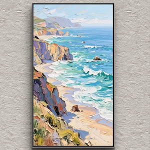 Puede incluir: Pintura al &oacute;leo de un paisaje costero con marco negro. La obra representa una playa con olas turquesas rompiendo contra acantilados. Los acantilados est&aacute;n pintados en tonos morados, naranjas y verdes, bajo un cielo azul.