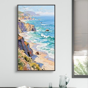 Puede incluir: Pintura al &oacute;leo enmarcada en negro que representa un paisaje costero. La obra muestra el oc&eacute;ano encontr&aacute;ndose con la orilla, con acantilados y olas en tonos de azul, turquesa y blanco. Los acantilados est&aacute;n pintados en tonos de naranja, morado y verde.