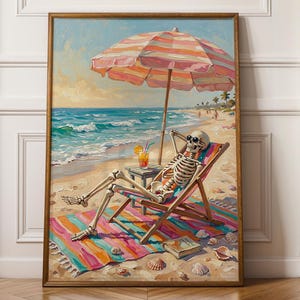 May include: A framed painting depicting a skeleton wearing sunglasses, reclining in a wooden beach chair under a pink and white striped umbrella on a sandy beach. The scene includes a colourful striped towel, a tropical drink, and seashells.