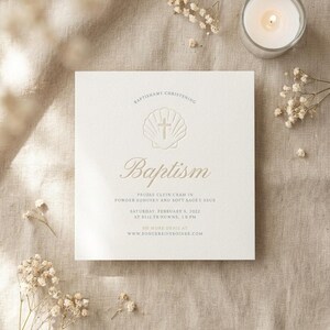 May include: A square white baptism invitation card featuring an embossed seashell and cross icon at the top. The text reads BAPTISHAMY CHRISTENING, Baptism, PRUDAE CLEIN CRAM IN POWDER SOMIHEY AND SOFT SAGEY SEUE, SATURDAY, FEBRUARY 5, 2022 AT BLIE TRXOWNS, 3:0 PM, and WWW.RONGEREINXROINEE.COM.