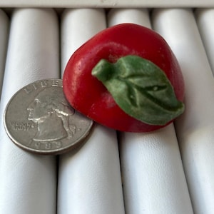 May include: A set of three ceramic mugs with a speckled, matte finish. The mugs are in shades of cream, light gray, and dark gray. Each mug has a simple, minimalist design and a rounded handle.