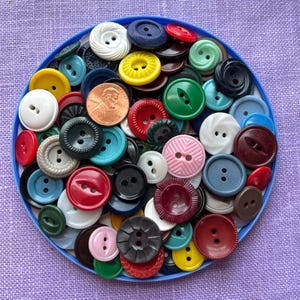 Lot of 100 Plus Assorted Plastic House Dress Type Buttons