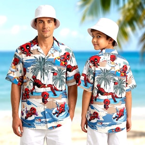 May include: Two short-sleeved button-down shirts and two white bucket hats featuring a repeating pattern of Deadpool characters in various beach activities, including swimming with pool floats and relaxing under palm trees on a sandy shore.