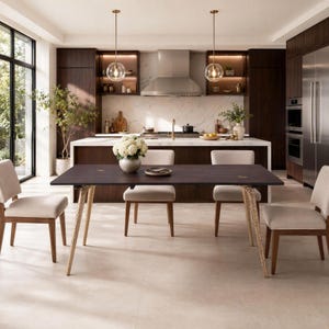 May include: A rectangular dark wood dining table with four light-colored upholstered chairs. The table features textured, light-toned wooden legs and a smooth surface. A white floral arrangement in a round vase sits in the center of the table.